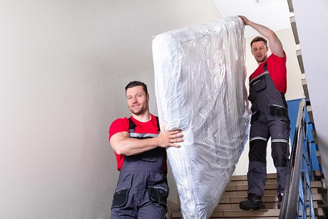 swift and safe removal of a box spring from a residence in Gladstone
